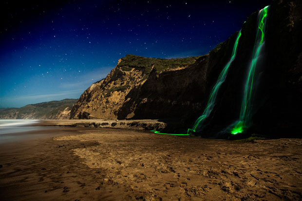 Colorful Long Exposure Photos of Glow Sticks Dropped Into Waterfalls glowwaterfall 8