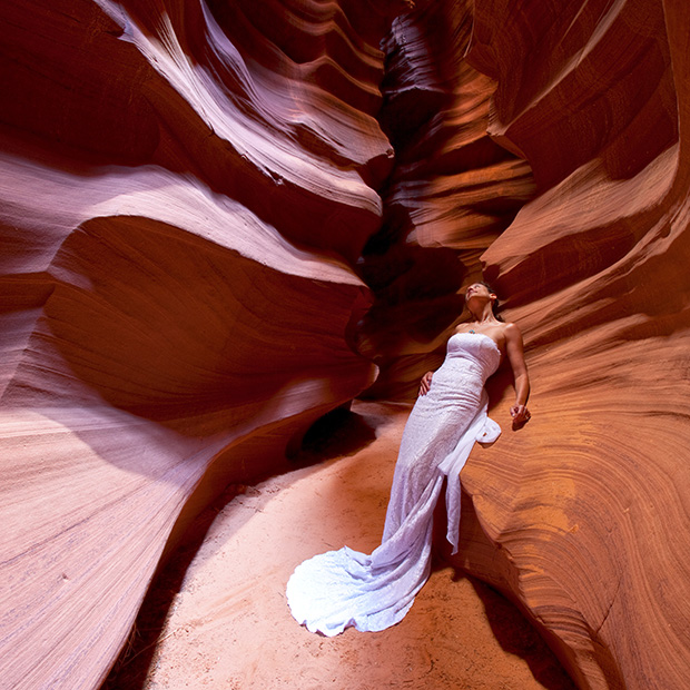 Couple Travels 135,000 Miles Over 5 Years for Wedding Dress Portraits AntelopeCanyanArizona